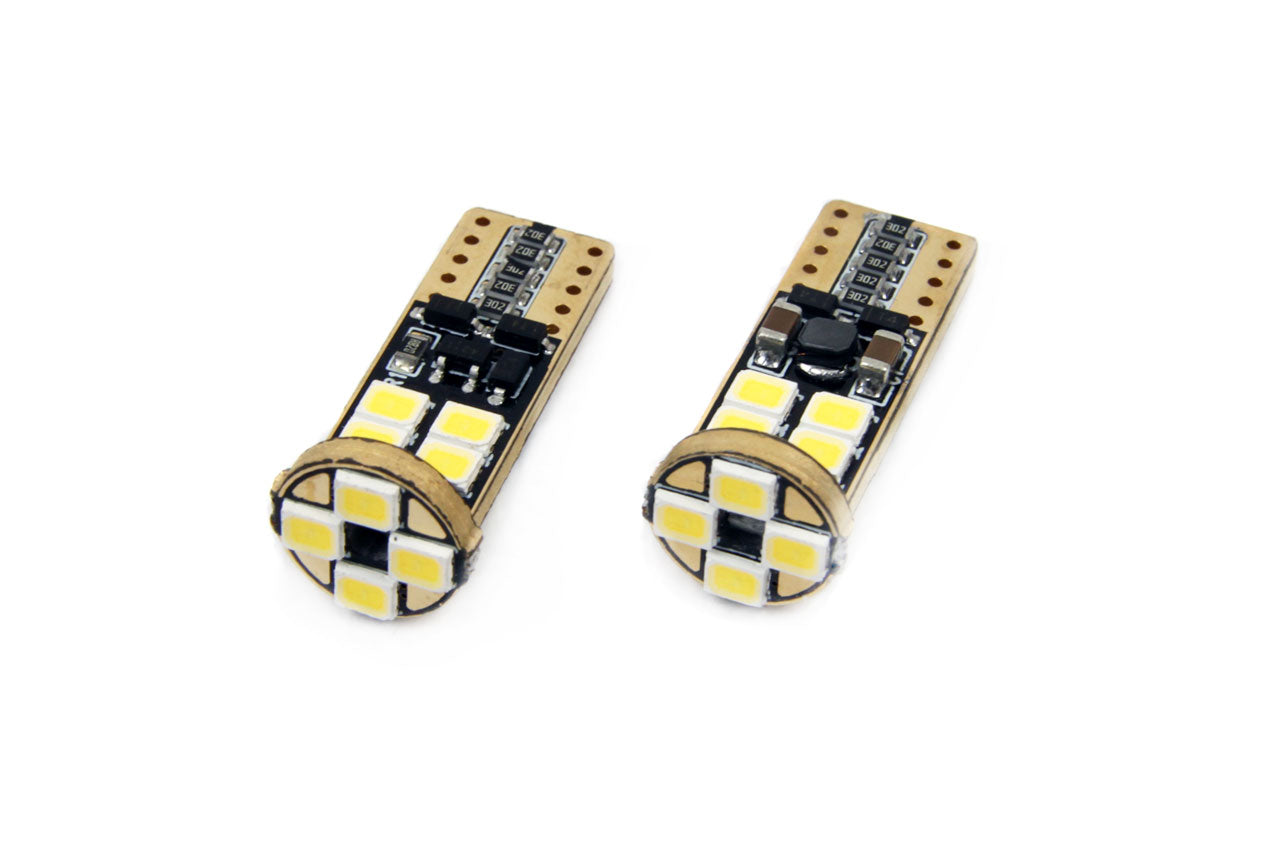 Set becuri auto cu LED CANBUS compatibil T10e W5W 12 SMD Alb 12/24V, destinat competitiilor auto sau off-road
